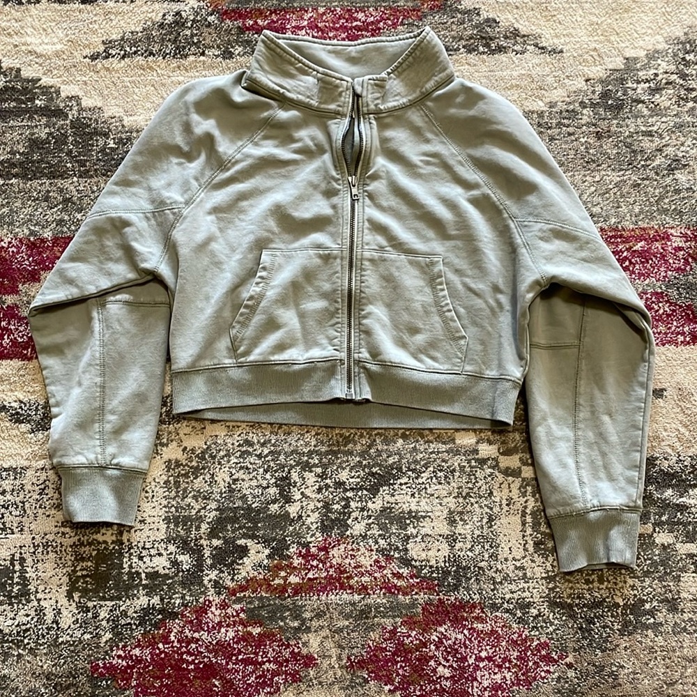 This is a cropped jacket by the brand Bixby never never been worn new with tags